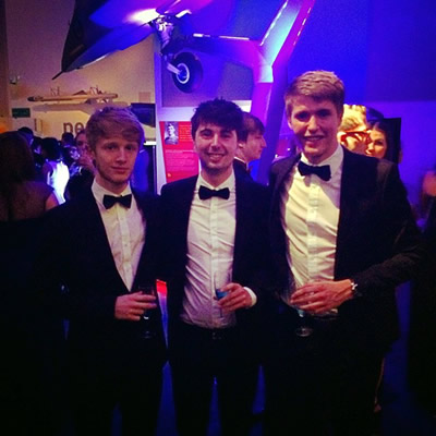 Sam, Harry, and a friend at a University ball