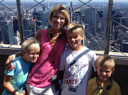 Aline and her children at the Empire State Building