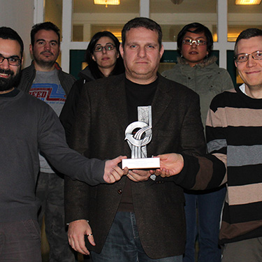 Kostas and his group with their IChemE award for Bioprocessing. 