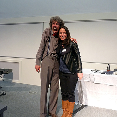 Sarah posing with 'Einstein' while speaking at the Manchester Science Festival