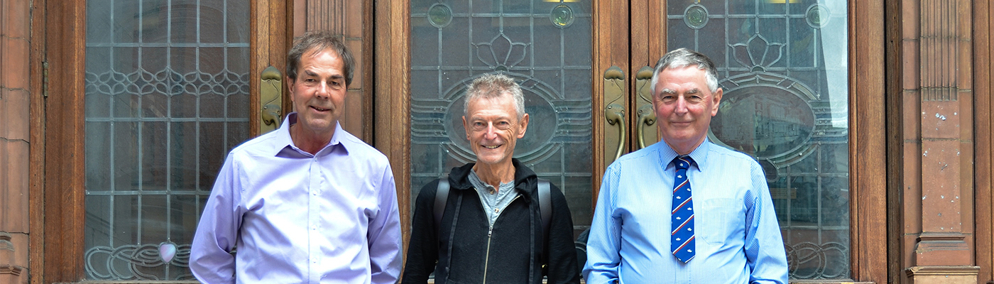 The three men outside Sackville Street Building
