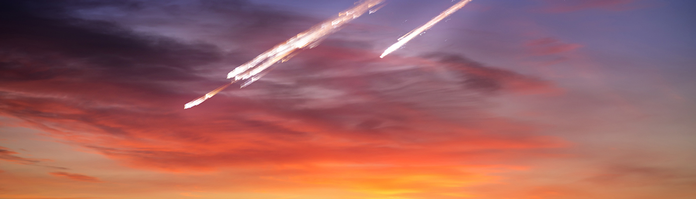 Meteorites in a colourful sky